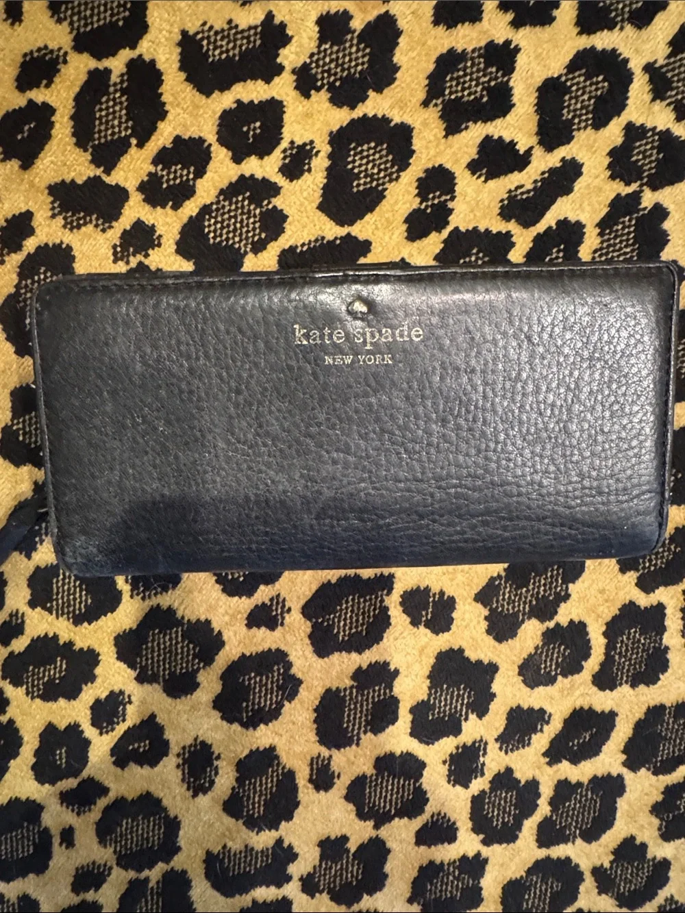 kate spade Black Pebbled Leather Continental Wallet with Gold Logo